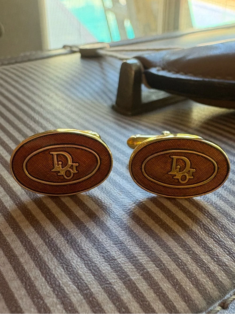 Dior Gold-Tone Oval Brown Enamel Logo Cufflinks